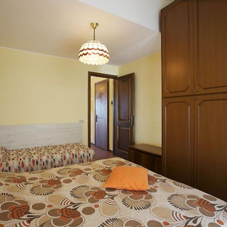 Apartamento Residenza La Vela Baveno Habitación foto
